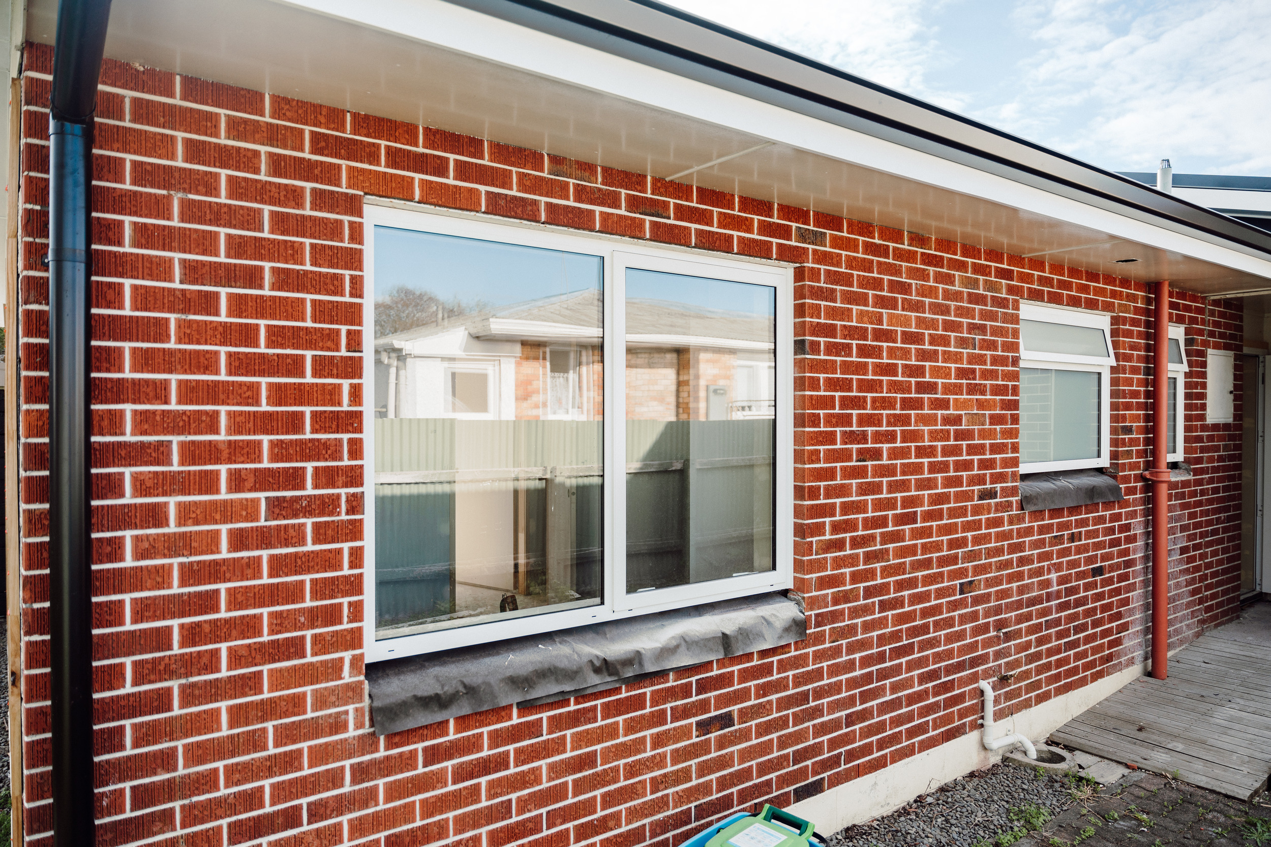Brick exterior window repair — Diack Homes cladding