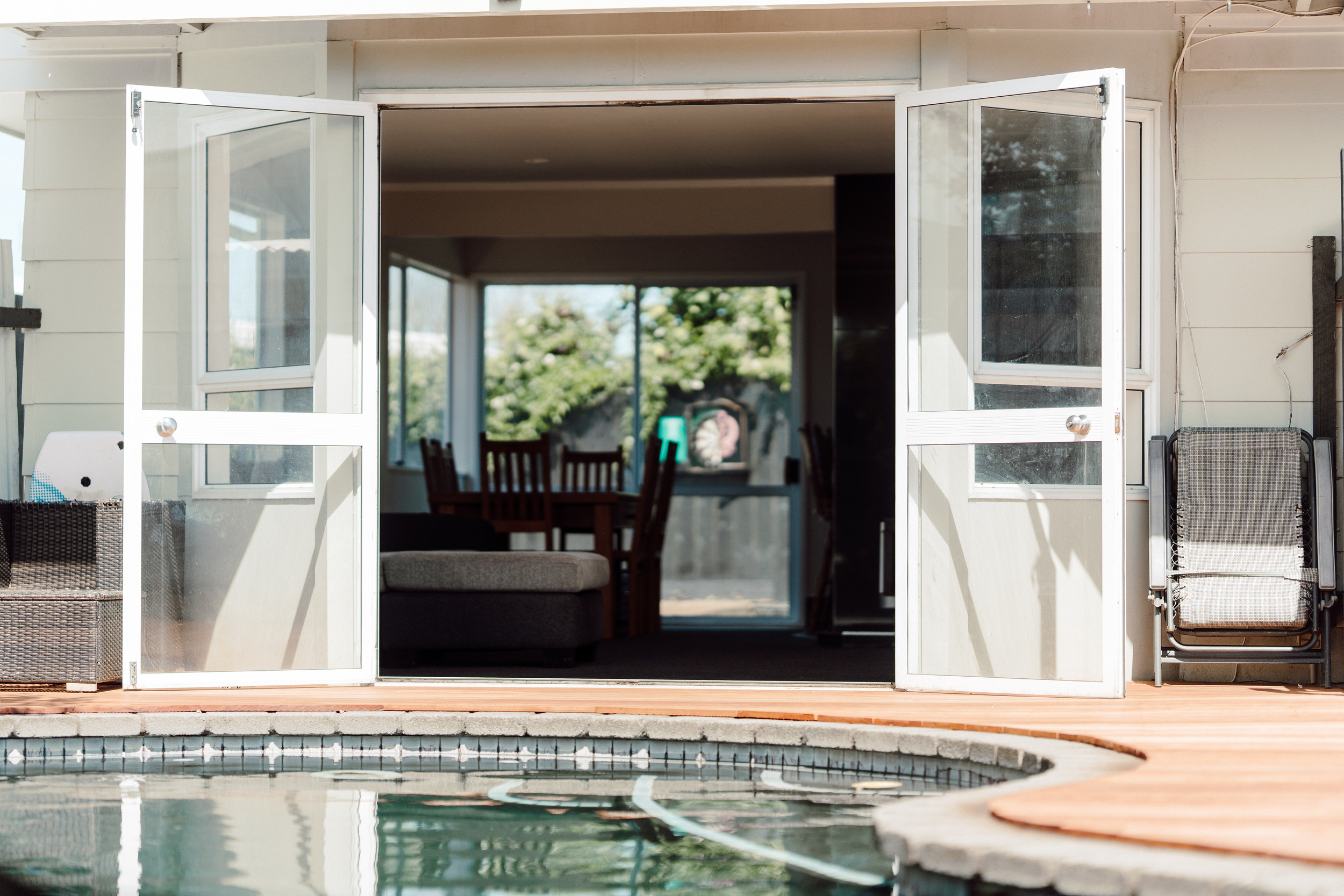 Open poolside living — Diack Homes home extension